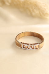 KIORAH Women Rose Gold-Toned LOVE Bracelet in 925 Silver